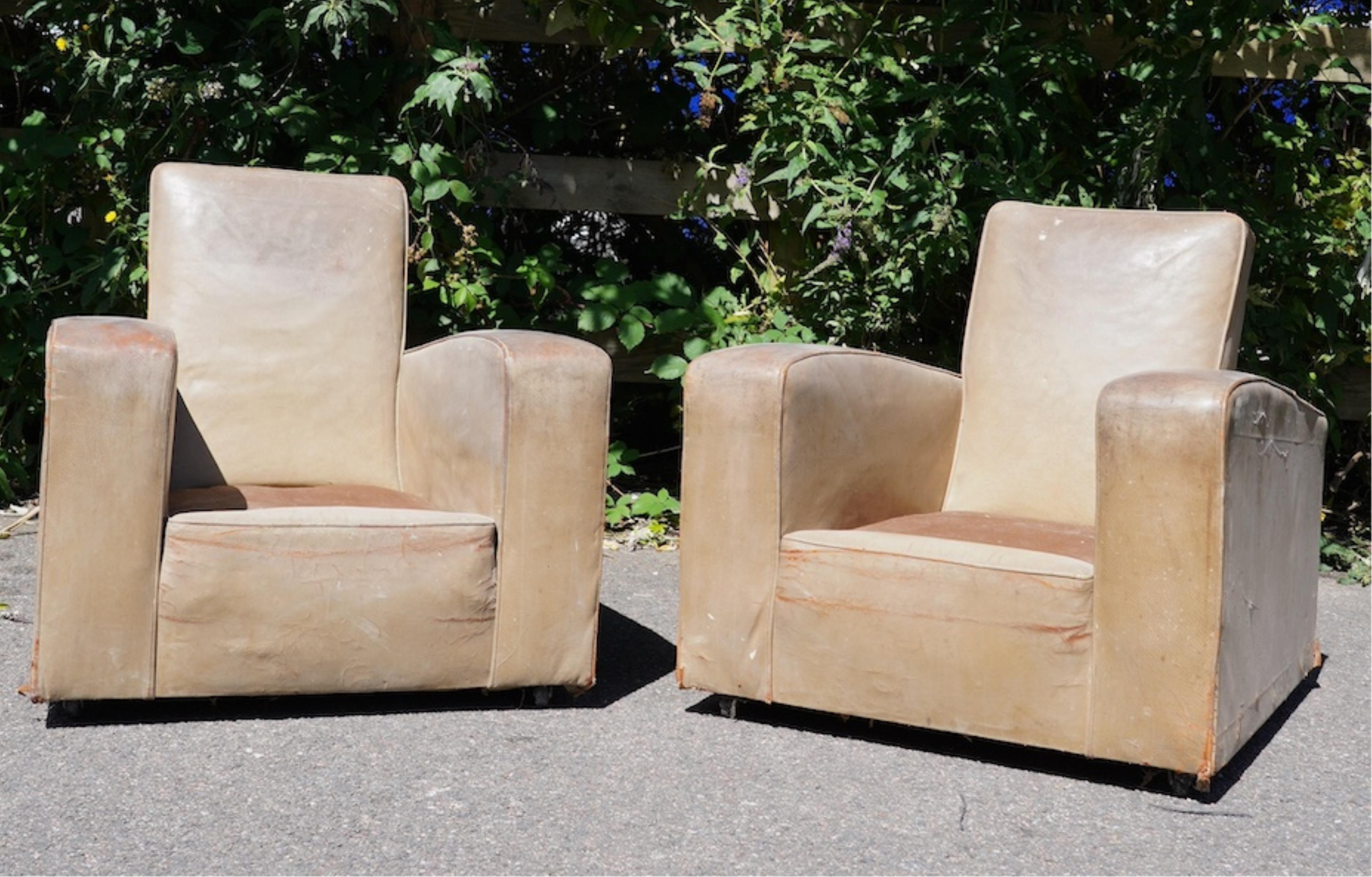 A pair of leather club armchairs, width 85cm, depth 88cm, height 84cm. Condition - poor